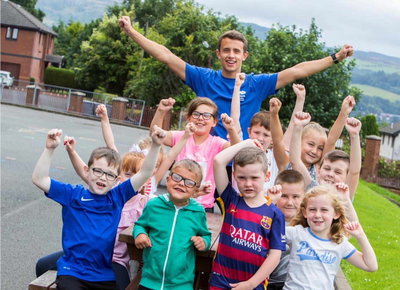 Andrew Campbell coach and kids.jpg