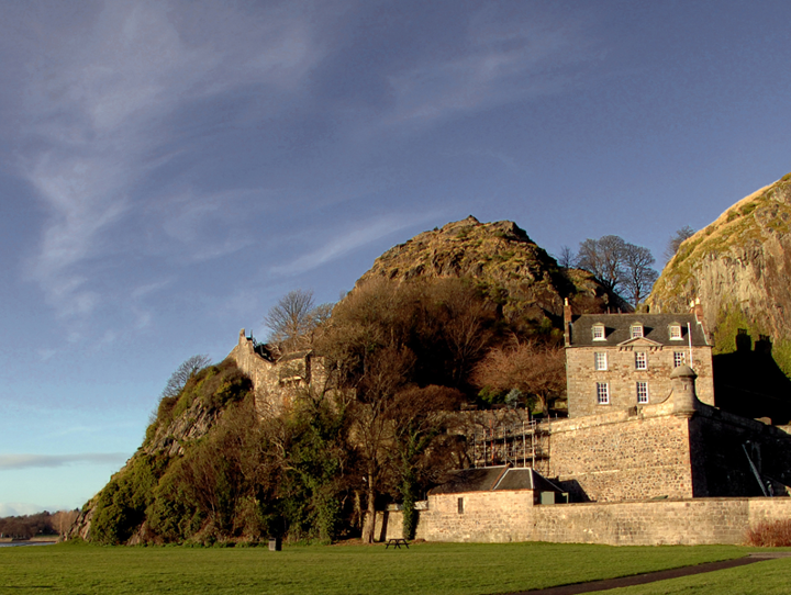 Photo of Dumbarton Castle with  blue sky over head with a few thin clouds