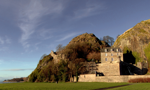 Photo of Dumbarton Castle with  blue sky over head with a few thin clouds
