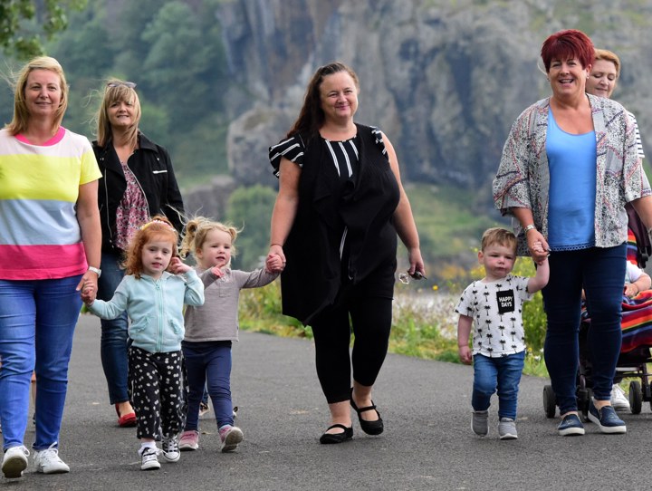 Group of childminders and children
