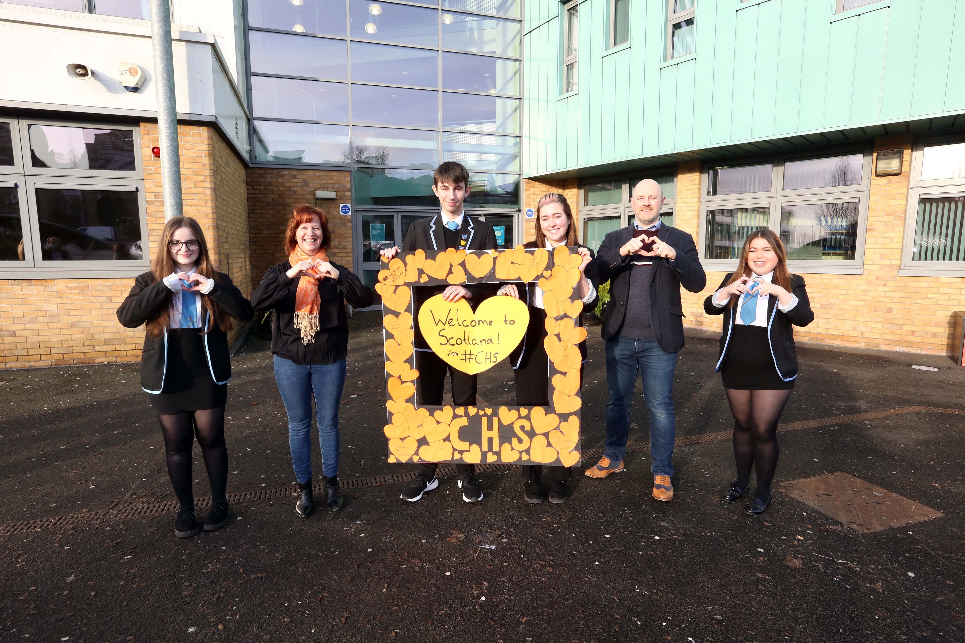 Image of pupils with orange hearts