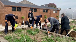 Melfort Park - people gardening