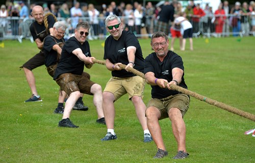 Mens winning Tug of War team