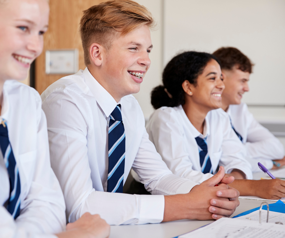 Young people sitting in a class room