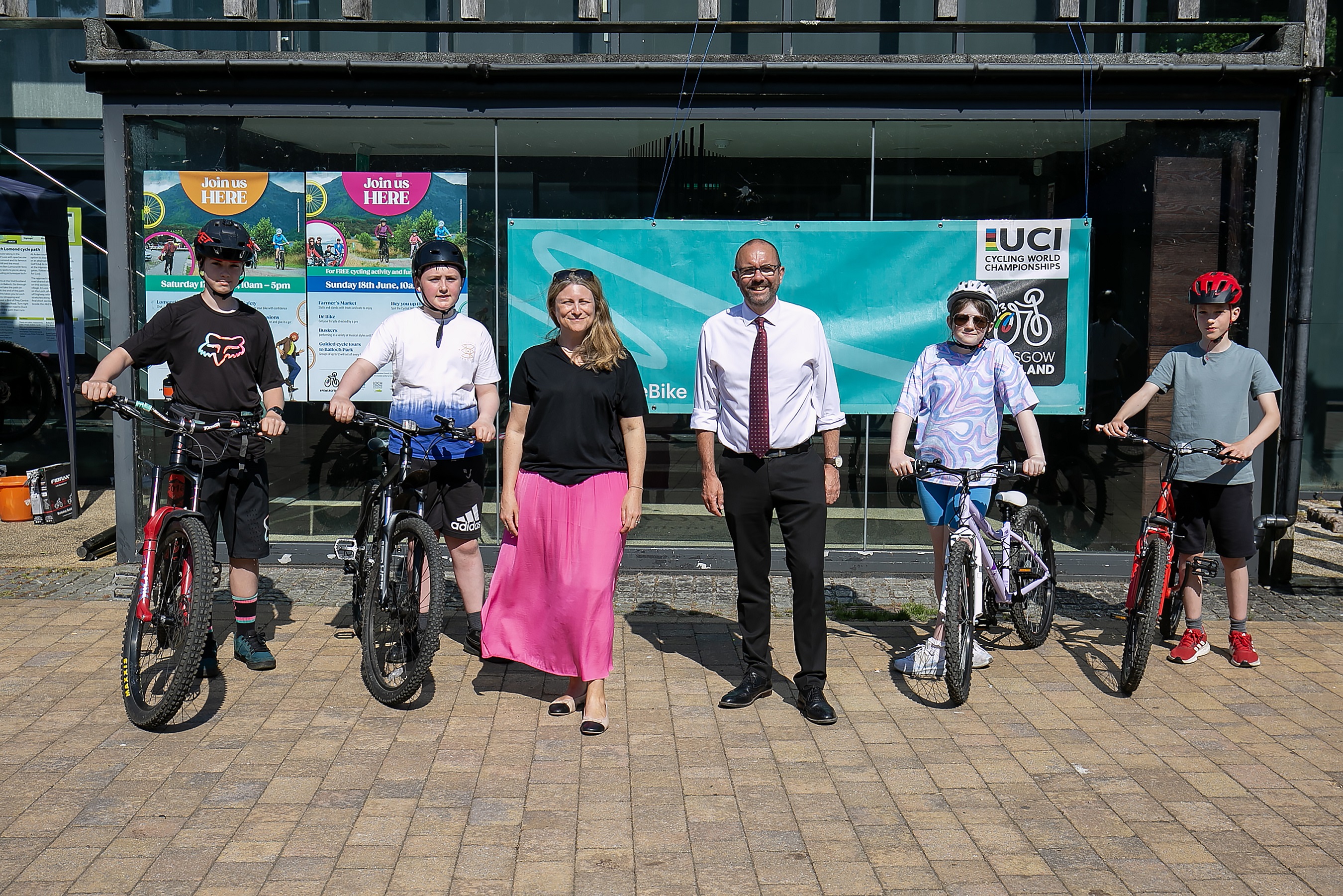 Children and Councillors at Lomond Shores bike event on bikes